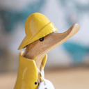 Duckling Raincoats Sculpture | Yellow