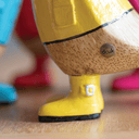 Duckling Raincoats Sculpture | Yellow