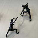 Adam Climbing Man Sculpture